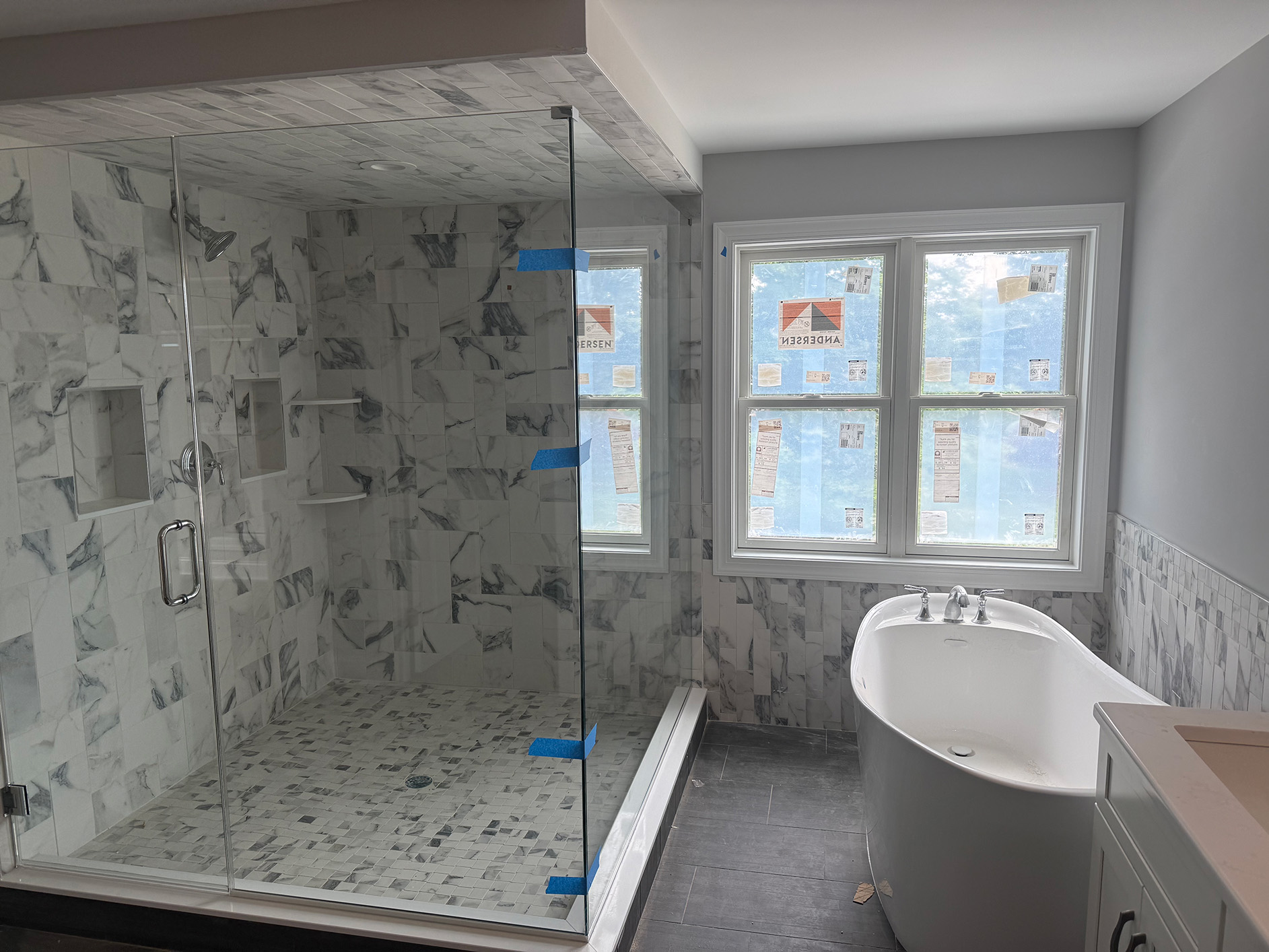 White Kitchen Cabinets with Dark Backsplash Tile