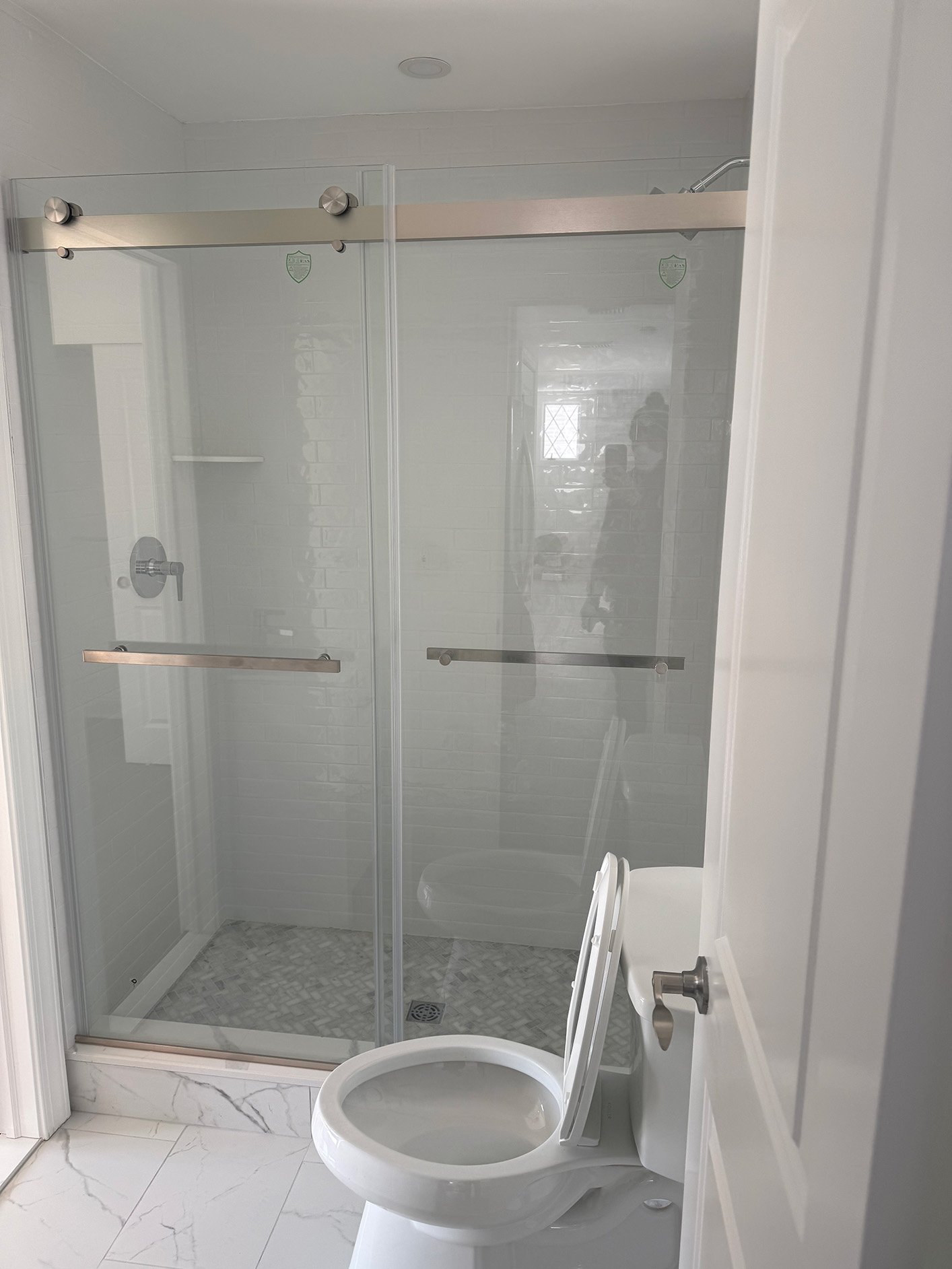 White Kitchen Cabinets with Dark Backsplash Tile