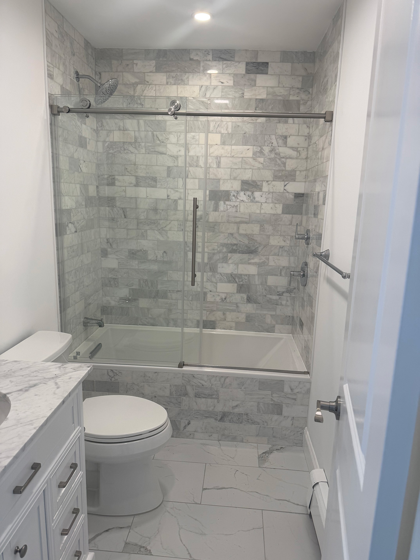 Modern Bathroom Remodel Tiled Shower and Vanity